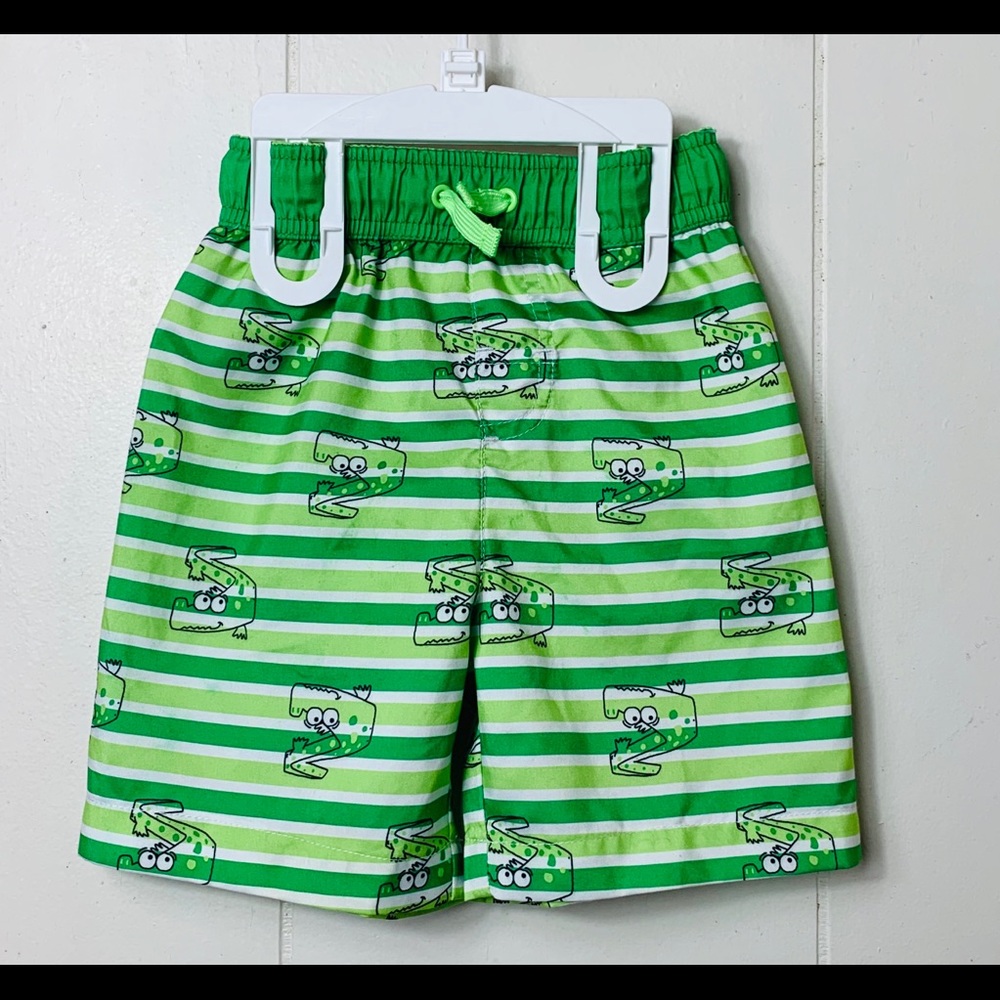 See ya later alligator 🐊 4T Boys swimming trucks!